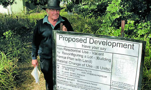Lionel Baguley is opposing the plan to build six units for elderly people at the vacant blocks behind Akooramak. Lionel Baguley is opposing the plan to build six units for elderly people at the vacant blocks behind Akooramak.